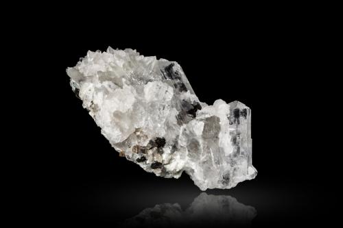 Sellaite with Calcite<br />Huanzala Mine, Huallanca District, Dos de Mayo Province, Huánuco Department, Peru<br />4,0	x	6,0	x	3,0	cm<br /> (Author: MIM Museum)