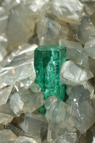 Beryl (variety emerald), Calcite, Dolomite<br />Muzo mining district, Western Emerald Belt, Boyacá Department, Colombia<br />54x53x31mm, xl=5mm<br /> (Author: Fiebre Verde)