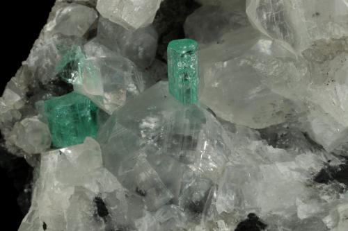 Beryl (variety emerald), Calcite<br />La Pita mining district, Municipio Maripí, Western Emerald Belt, Boyacá Department, Colombia<br />49x44x36mm, xls=6 & 4mm<br /> (Author: Fiebre Verde)