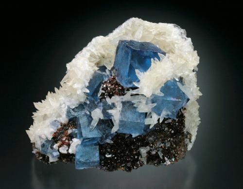 Fluorite, Sphalerite, and Calcite<br />Minerva I Mine, Ozark-Mahoning group, Cave-in-Rock Sub-District, Hardin County, Illinois, USA<br />8x7x6 cm overall size<br /> (Author: Jesse Fisher)