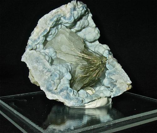 Millerite and Calcite on Quartz (variety chalcedony)<br />State Route 37 road cuts, Harrodsburg, Clear Creek Township, Monroe County, Indiana, USA<br />Geode is 7 cm. The millerite spray is 4cm<br /> (Author: Bob Harman)