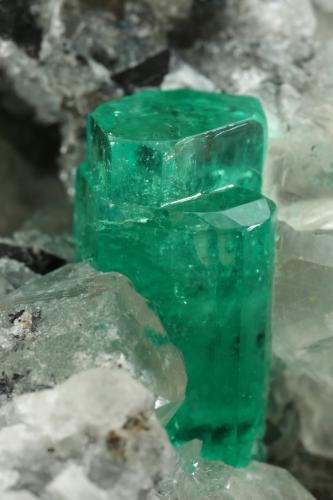 Beryl (variety emerald), Calcite, Pyrite<br />Muzo mining district, Western Emerald Belt, Boyacá Department, Colombia<br />65x90x85mm, aggregate=14x9mm<br /> (Author: Fiebre Verde)