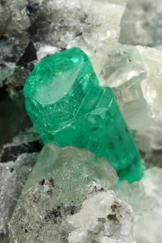 Beryl (variety emerald), Calcite, Pyrite<br />Muzo mining district, Western Emerald Belt, Boyacá Department, Colombia<br />65x90x85mm, aggregate=14x9mm<br /> (Author: Fiebre Verde)