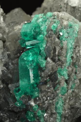 Beryl (variety emerald), Calcite, Dolomite<br />La Pita mining district, Municipio Maripí, Western Emerald Belt, Boyacá Department, Colombia<br />120x83x68mm, main xl=14mm<br /> (Author: Fiebre Verde)