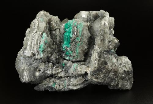 Beryl (variety emerald), Calcite, Dolomite<br />La Pita mining district, Municipio Maripí, Western Emerald Belt, Boyacá Department, Colombia<br />120x83x68mm, main xl=14mm<br /> (Author: Fiebre Verde)