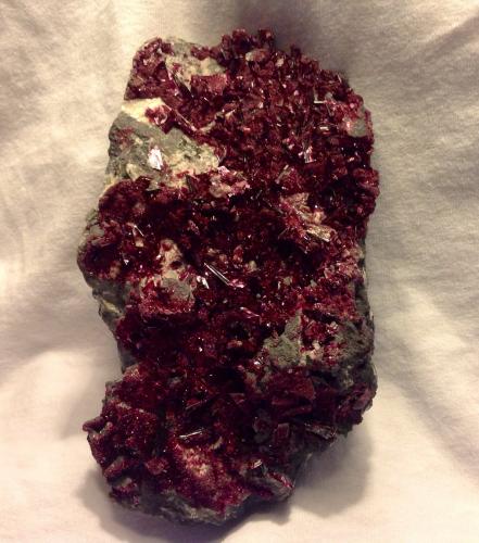 Erythrite<br />Aghbar Mine (Arhbar Mine), Bou Azzer mining district, Zagora Province, Drâa-Tafilalet Region, Morocco<br />16 x  8.5 cm<br /> (Author: JC)