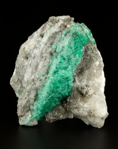 Beryl (variety emerald), Calcite, Pyrite<br />Coscuez mining district, Jerusalem Mine, Municipio San Pablo de Borbur, Western Emerald Belt, Boyacá Department, Colombia<br />53x61x36mm<br /> (Author: Fiebre Verde)