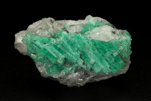 Beryl (variety emerald), Calcite, Pyrite, Quartz<br />Coscuez mining district, Jerusalem Mine, Municipio San Pablo de Borbur, Western Emerald Belt, Boyacá Department, Colombia<br />H:44mm x W:25mm<br /> (Author: Fiebre Verde)