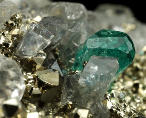 Beryl (variety emerald), Dolomite, Pyrite<br />Chivor mining district, El Acuario Mine, Municipio Chivor, Eastern Emerald Belt, Boyacá Department, Colombia<br />68x66x35mm, xls up to 10mm<br /> (Author: Fiebre Verde)