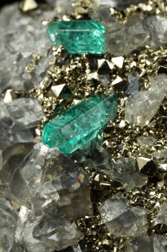 Beryl (variety emerald), Dolomite, Pyrite<br />Chivor mining district, El Acuario Mine, Municipio Chivor, Eastern Emerald Belt, Boyacá Department, Colombia<br />68x66x35mm, xls up to 10mm<br /> (Author: Fiebre Verde)