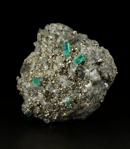 Beryl (variety emerald), Dolomite, Pyrite<br />Chivor mining district, El Acuario Mine, Municipio Chivor, Eastern Emerald Belt, Boyacá Department, Colombia<br />68x66x35mm, xls up to 10mm<br /> (Author: Fiebre Verde)