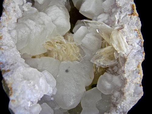 Calcite and Barite on Quartz<br />Monroe Reservoir spillway, Monroe County, Indiana, USA<br />calcites up to 4.0 cm, barite up to 2.5 cm<br /> (Author: Bob Harman)