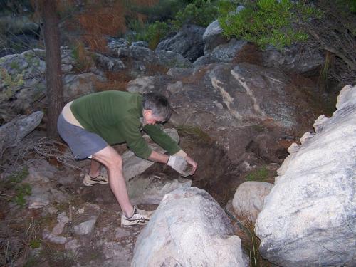 Me removing a large rock of sandstone. (Author: Pierre Joubert)