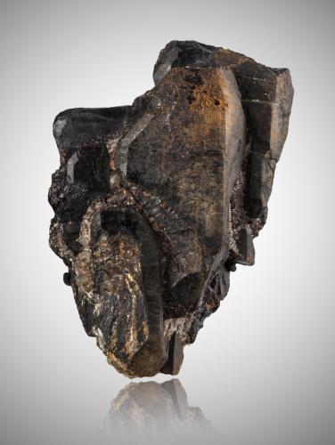 Gadolinite<br />Slobrekka Pegmatite, Frikstad, Iveland, Aust-Agder, Norway<br />9,0	x	14,5	x	8,0	cm<br /> (Author: MIM Museum)