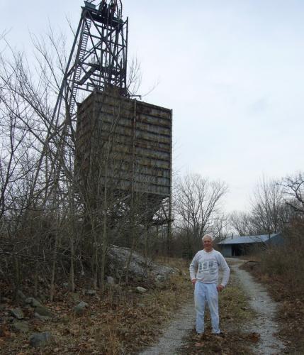 _Yes, that is me in early April, 2005.
The Annabel Lee head frame is in the background. (Author: Bob Harman)