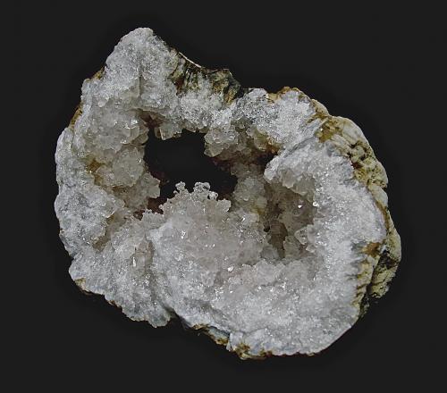 Opal (variety hyalite) on quartz<br />Monroe County, Indiana, USA<br />geode is 11  cm, the opal area is 2 cm<br /> (Author: Bob Harman)