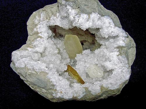 Barite and Calcite on Quartz<br />State Route 37 road cuts, Harrodsburg, Clear Creek Township, Monroe County, Indiana, USA<br />geode is 21 cm    calcite is 8 cm     barite is 4.7 cm<br /> (Author: Bob Harman)