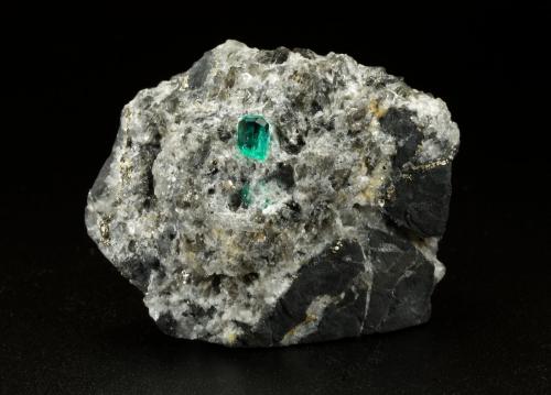 Beryl (variety emerald), Calcite, Pyrite<br />Chivor mining district, Municipio Chivor, Eastern Emerald Belt, Boyacá Department, Colombia<br />45x36x29mm, xl=4mm<br /> (Author: Fiebre Verde)