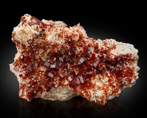 Vanadinite on Barite<br />Mibladen (distrito minero Mibladen), Midelt, Provincia Midelt, Región Drâa-Tafilalet, Marruecos<br />25,0	x	17,0	x	10,0	cm<br /> (Author: MIM Museum)