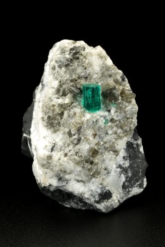 Beryl (variety emerald), Calcite, Dolomite<br />La Pita mining district, Cunas Mine, Municipio Maripí, Western Emerald Belt, Boyacá Department, Colombia<br />38x58x47mm, xl=9mm<br /> (Author: Fiebre Verde)