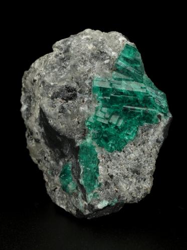 Beryl (variety emerald), Calcite<br />Muzo mining district, Western Emerald Belt, Boyacá Department, Colombia<br />55x53x29mm, aggregate=21x27mm<br /> (Author: Fiebre Verde)