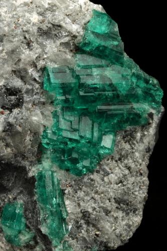 Beryl (variety emerald), Calcite<br />Muzo mining district, Western Emerald Belt, Boyacá Department, Colombia<br />55x53x29mm, aggregate=21x27mm<br /> (Author: Fiebre Verde)