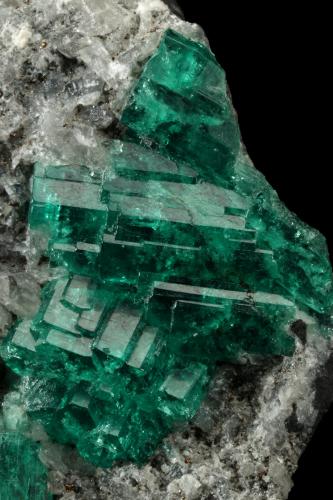 Beryl (variety emerald), Calcite<br />Muzo mining district, Western Emerald Belt, Boyacá Department, Colombia<br />55x53x29mm, aggregate=21x27mm<br /> (Author: Fiebre Verde)