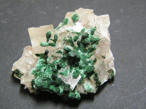 Malachite on Calcite<br />Tsumeb Mine, Tsumeb, Otjikoto Region, Namibia<br />35x35x15mm<br /> (Author: Heimo Hellwig)