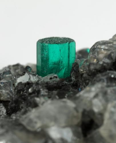 Beryl (variety emerald), Calcite, Dolomite<br />La Pita mining district, Municipio Maripí, Western Emerald Belt, Boyacá Department, Colombia<br />53x38x34mm, xl=5x4mm<br /> (Author: Fiebre Verde)