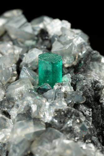 Beryl (variety emerald), Calcite, Dolomite<br />La Pita mining district, Municipio Maripí, Western Emerald Belt, Boyacá Department, Colombia<br />53x38x34mm, xl=5x4mm<br /> (Author: Fiebre Verde)