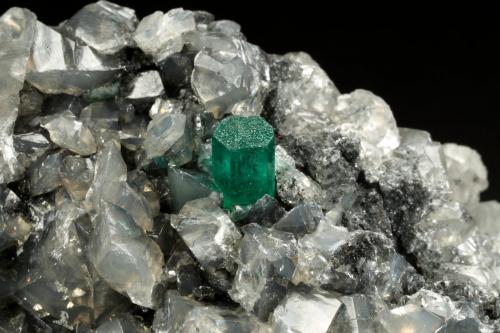 Beryl (variety emerald), Calcite, Dolomite<br />La Pita mining district, Municipio Maripí, Western Emerald Belt, Boyacá Department, Colombia<br />53x38x34mm, xl=5x4mm<br /> (Author: Fiebre Verde)