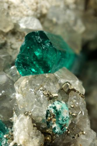 Beryl (variety emerald), Dolomite, Pyrite<br />Chivor mining district, San Gregorio Mine, Municipio Chivor, Eastern Emerald Belt, Boyacá Department, Colombia<br />21x58x31mm, largest xl=13mm<br /> (Author: Fiebre Verde)