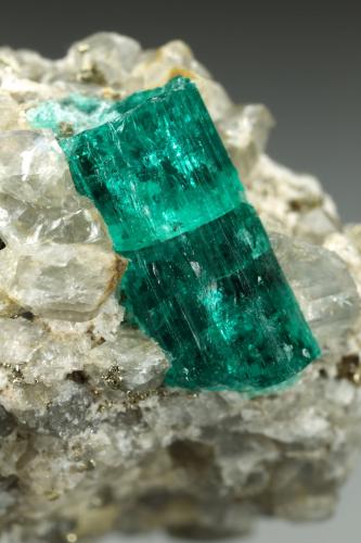 Beryl (variety emerald), Dolomite, Pyrite<br />Chivor mining district, San Gregorio Mine, Municipio Chivor, Eastern Emerald Belt, Boyacá Department, Colombia<br />21x58x31mm, largest xl=13mm<br /> (Author: Fiebre Verde)