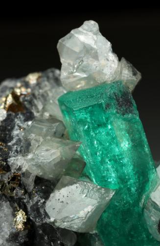 Beryl (variety emerald), Dolomite, Pyrite<br />Coscuez mining district, Calceteros Mine, Municipio San Pablo de Borbur, Western Emerald Belt, Boyacá Department, Colombia<br />29x45x27mm, xl=34mm<br /> (Author: Fiebre Verde)