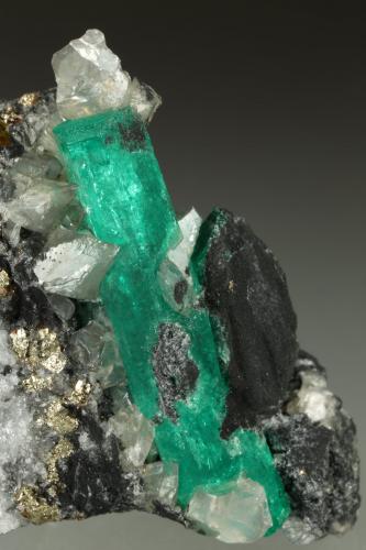 Beryl (variety emerald), Dolomite, Pyrite<br />Coscuez mining district, Calceteros Mine, Municipio San Pablo de Borbur, Western Emerald Belt, Boyacá Department, Colombia<br />29x45x27mm, xl=34mm<br /> (Author: Fiebre Verde)