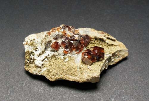 Garnet (Group)<br />Shigar Valley, Shigar District, Gilgit-Baltistan (Northern Areas), Pakistan<br />70mm x 40mm x 20mm<br /> (Author: Philippe Durand)