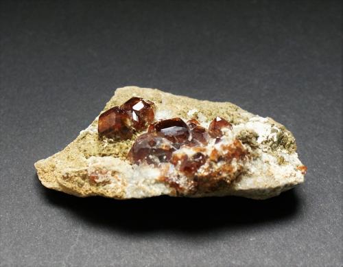 Garnet (Group)<br />Shigar Valley, Shigar District, Gilgit-Baltistan (Northern Areas), Pakistan<br />70mm x 40mm x 20mm<br /> (Author: Philippe Durand)
