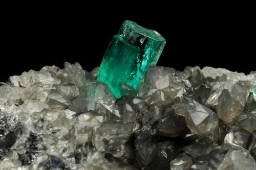 Beryl (variety emerald), Calcite, Dolomite, Pyrite<br />Coscuez mining district, Municipio San Pablo de Borbur, Western Emerald Belt, Boyacá Department, Colombia<br />70x50x55mm, aggregate=10mm<br /> (Author: Fiebre Verde)