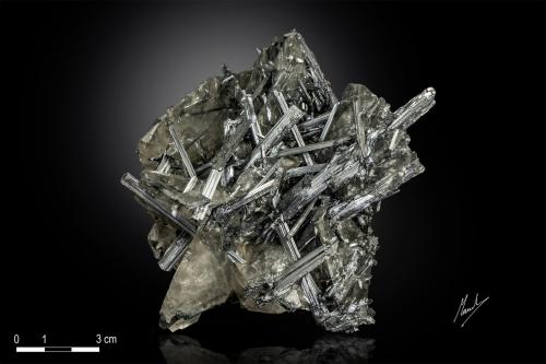 Stibnite on Calcite<br />Xikuangshan Sb deposit, Lengshuijiang, Loudi Prefecture, Hunan Province, China<br />110 X 93 mm<br /> (Author: Manuel Mesa)