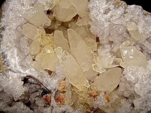 Calcite, Dolomite, Barite and Sphalerite on Quartz<br />State Route 37 road cuts, Harrodsburg, Clear Creek Township, Monroe County, Indiana, USA<br />the largest doubly terminated calcite is 7 cm<br /> (Author: Bob Harman)