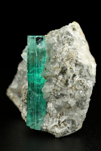 Beryl (variety emerald), Dolomite, Pyrite<br />Chivor mining district, Municipio Chivor, Eastern Emerald Belt, Boyacá Department, Colombia<br />29x27x19mm, xl=22mm<br /> (Author: Fiebre Verde)