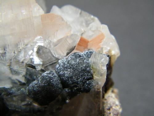 Calcite and Mottramite<br />Tsumeb Mine, Tsumeb, Otjikoto Region, Namibia<br />100mm x 60mm x 50mm<br /> (Author: Heimo Hellwig)