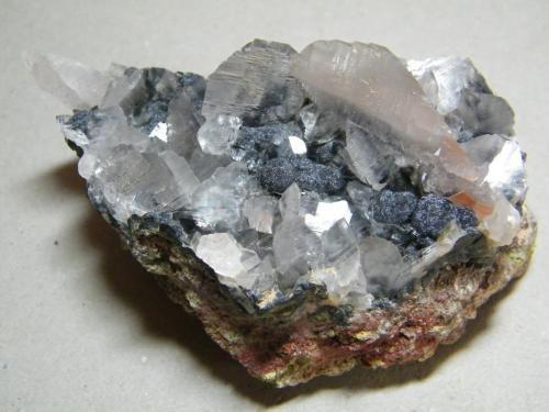 Calcite and Mottramite<br />Tsumeb Mine, Tsumeb, Otjikoto Region, Namibia<br />100mm x 60mm x 50mm<br /> (Author: Heimo Hellwig)