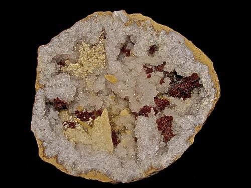 Calcite, Barite, Dolomite (variety iron rich dolomite) on Quartz<br />Mission Valley Ravine, Monroe County, Indiana, USA<br />geode is 22 cm x 22 cm.    The largest calcite is 4.5 cm.     The barite groupings are up to 5.0 cm. The dolomite groupings are up to 4.0 cm<br /> (Author: Bob Harman)