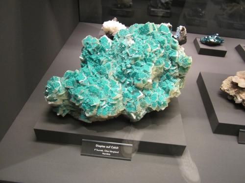 Dioptase, Calcite<br />Tsumeb Mine, Tsumeb, Otjikoto Region, Namibia<br /><br /> (Author: Tobi)