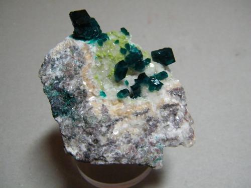 Dioptase on Calcite<br />Tsumeb Mine, Tsumeb, Otjikoto Region, Namibia<br />70mm x 60mm x 40mm<br /> (Author: Heimo Hellwig)