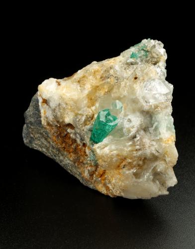 Beryl (variety emerald), Calcite, Quartz<br />Peñas Blancas Mine, Municipio San Pablo de Borbur, Western Emerald Belt, Boyacá Department, Colombia<br />52x32x40mm, main xl=10mm<br /> (Author: Fiebre Verde)