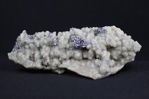 Molibdenita, Cuarzo<br />Mexico<br />14 x 6.3 x 3.5 centimetros<br /> (Autor: Ricardo Melendez)