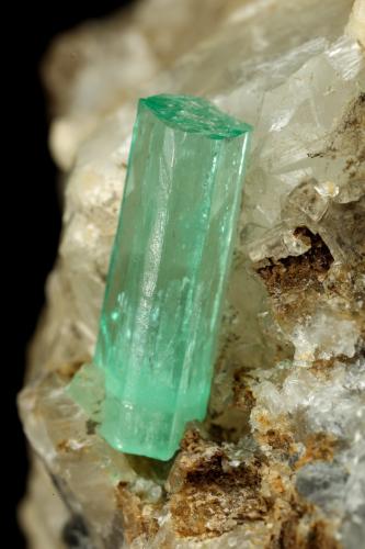 Beryl (variety emerald), Calcite<br />La Pita mining district, Polveros Mine, Municipio Maripí, Western Emerald Belt, Boyacá Department, Colombia<br />67x75x65mm, main xl=14mm<br /> (Author: Fiebre Verde)