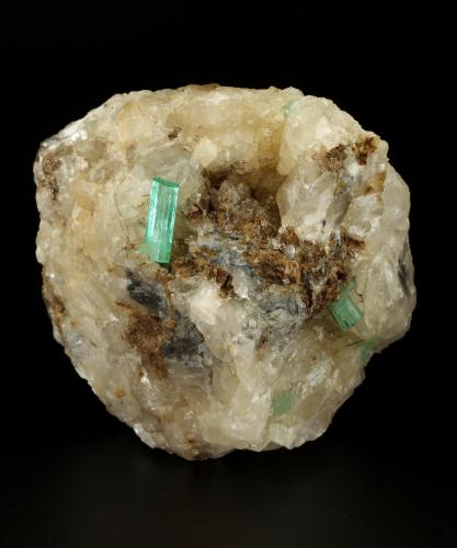 Beryl (variety emerald), Calcite<br />La Pita mining district, Polveros Mine, Municipio Maripí, Western Emerald Belt, Boyacá Department, Colombia<br />67x75x65mm, main xl=14mm<br /> (Author: Fiebre Verde)